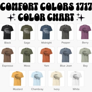 May include: A color chart displays various t-shirt colors, including black, sage, midnight, and berry. Each shirt features a graphic design. The text "COMFORT COLORS 1717" and "COLOR CHART" are at the top.