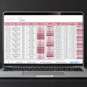 May include: A laptop screen displays a pink and white CRM (Customer Relationship Management) dashboard for an insurance agent. The spreadsheet-like interface organizes client data, including names, phone numbers, and policy details.