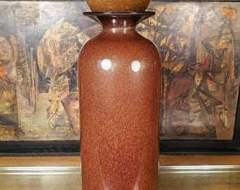 Glistening Golden Cylindrical Blown Glass Vase With Matching Paperweight Topper.