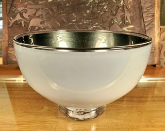 Blown glass "Shimmering Pond" round bowl with clear foot and lip.