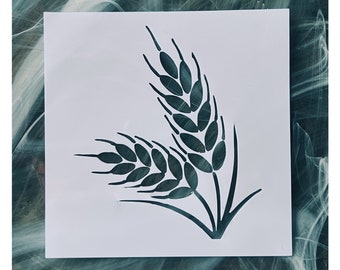 May include: A black stencil of wheat stalks on a white background. The stencil is for crafting and decorating.