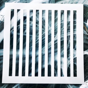 May include: White stencil with a grid of vertical lines. The stencil is made of a thin, flexible material and is designed for use with paint or other mediums.