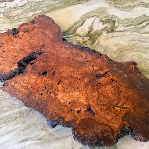 Cherry Burl live edge charcuterie 1&1/8x8x18 hand sanded and finished with Odie’s oil