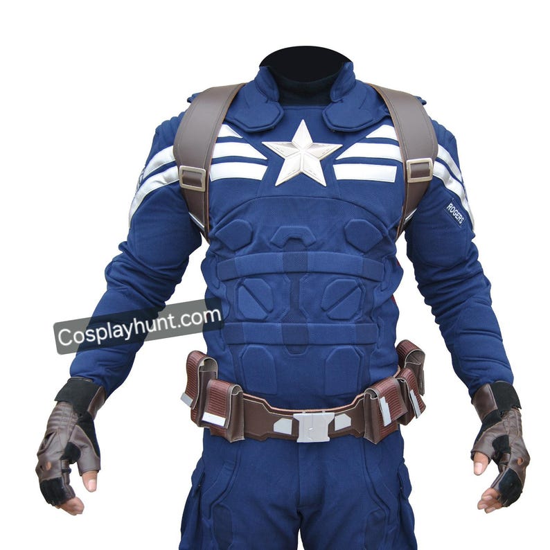 May include: A Captain America costume, featuring a navy blue jumpsuit with a white star emblem and white stripes on the sleeves. The costume includes a brown belt, shoulder straps, and fingerless gloves. The text "Cosplayhunt.com" is visible.