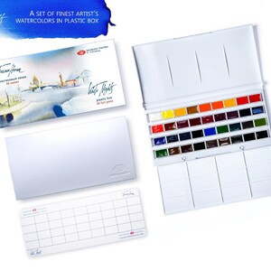 May include: A set of White Nights artist's watercolors in a white plastic box. The box is open, revealing an array of vibrant colors. The set includes a palette and a cover with the text "A set of finest artist's watercolors in plastic box."