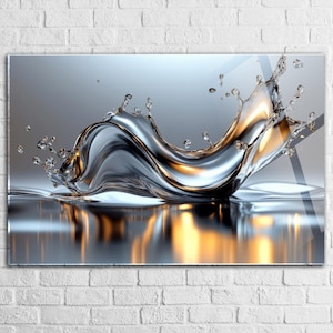 May include: A digitally created image of a water splash. The water has a reflective, metallic silver appearance, with gold and amber highlights. The splash is dynamic, with droplets and a wave-like form. The background is a gradient of silver and grey.