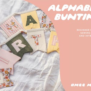 May include: A handmade alphabet bunting with fabric pennants in various colors and patterns. The letters are appliqued onto the flags. The image also includes text that reads "ALPHABET BUNTING" and "BEGINNER FRIENDLY SEWING PATTERN AND INTRUCTIONS".