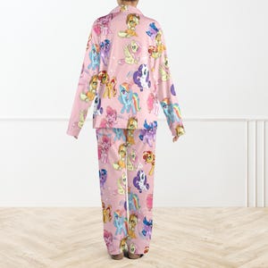 May include: A rustic wooden sign with the text "Welcome to our home" in white lettering. The sign has a distressed finish and a simple, inviting design, ideal for front door decor.