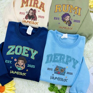 Embroidered KPOP Band Huntrix Sweatshirt, Huntrix Demon Hunters Shirt, Mira Rumi Joey Shirt, Demon Hunter Merch, Gift For Kpop Fan, Kpop Tee