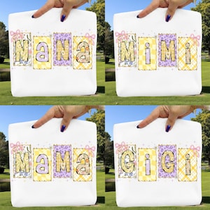 May include: White tote bags with the words "NANA", "MIMI", "MAMA", and "GIGI" printed on them. Each word is in a different decorative font, with floral and checkered patterns. Pink bows and floral accents are also present.