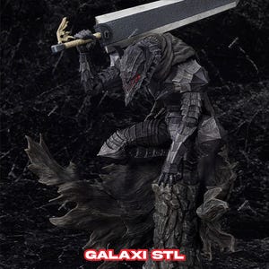 May include: A black and grey detailed action figure of a character from the anime series Berserk. The figure is holding a large sword and is posed in a dynamic action pose. The figure is standing on a rocky base.