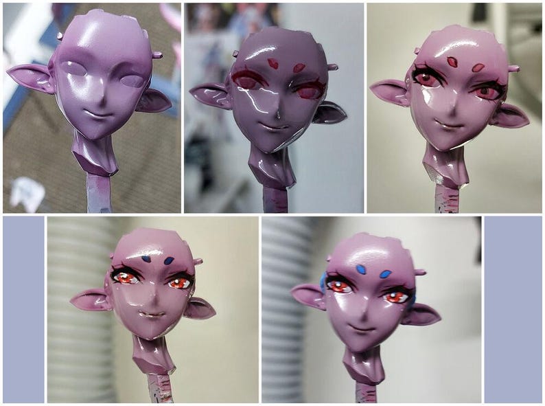 May include: Four stages of painting a pink resin figurine of a humanoid head with large eyes and pointed ears. The figurine is on a stick and the stages show the progression of painting the eyes and face.