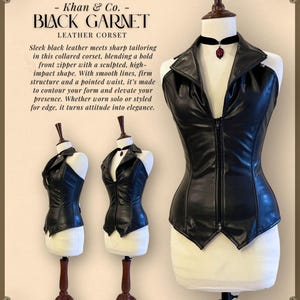 May include: Black leather corset with a collared design, front zipper, and pointed waist. The corset is displayed on a mannequin with a black choker and a red pendant. The text on the image reads "BLACK GARNET LEATHER CORSET".