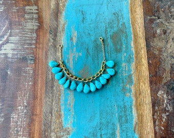 The Turquoise Twist- Teardrop Turquoise Stone Charms on a Large Gold Chain Bracelet