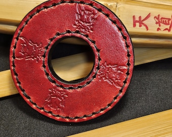 Tsuba size 38 red leather with Oni demon motifs for shinai kendo
