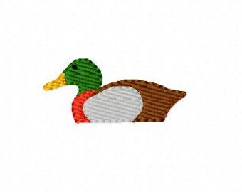 May include: A small embroidered image of a brown and green duck with a yellow beak.