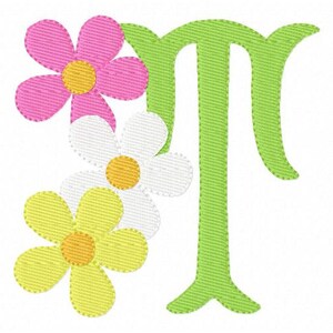 May include: A green letter "T" with three daisy flowers in pink, white, and yellow.