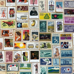 May include: A collection of vintage postage stamps featuring a variety of designs, including animals, landscapes, and historical figures. The stamps are arranged in rows on a wooden surface. Some of the stamps feature text, such as "American Bald Eagle", "Save Our Soil", and "Support Our Youth".