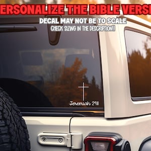 May include: White decal of a cross and the text "Jeremiah 29:1" on a vehicle window. The text "PERSONALIZE THE BIBLE VERSE!" is at the top. The text "DECAL MAY NOT BE TO SCALE CHECK SIZING IN THE DESCRIPTION!!" is also visible.