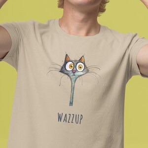 Camiseta divertida de gato - "WAZZUP" - Camiseta de gatito curioso con ojos abiertos - Camiseta de gato de dibujos animados - Regalo para amantes de los animales y almas tontas