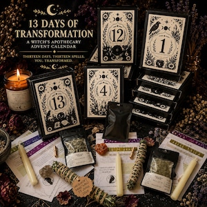 May include: A 13 Days of Transformation witch's apothecary advent calendar set featuring black and white boxes numbered 1 through 13, dried herbs in small pouches, taper candles, spell cards, and a lit candle in a glass jar with a label.