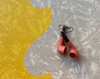 Vintage plastic pipe earrings.