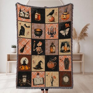 May include: A woven throw blanket featuring a grid of twenty square panels with Halloween-themed illustrations including a camper, potion bottles, a black cat, a cauldron, a skeleton, a pumpkin, a witch hat, a ghost, an owl, and a vintage clock.