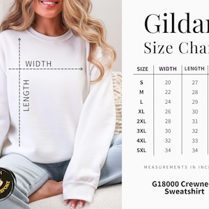 以下が含まれることがあります： 白のG18000クルーネックトレーナー、サイズチャート付き。チャートは、Sから5XLまでのサイズのインチ単位の測定値を表示します。トレーナーの幅は50.8〜86.4cm、長さは68.6〜86.4cm、袖は83.8〜101.6cmです。