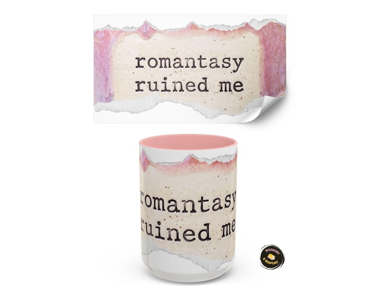 May include: A white ceramic mug with a pink interior and the text "romantasy ruined me" printed on it. The design features a torn paper effect with pink and beige tones. A matching sticker is above the mug.