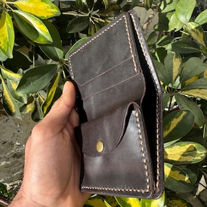 Cartera artesanal de cuero