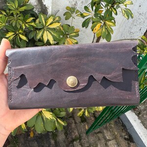 Cartera artesanal de cuero