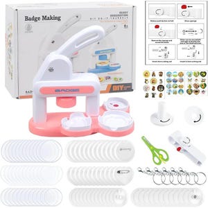 May include: A white and pink badge making machine kit including a press, a circular cutter, green scissors, metal pin backs, clear plastic covers, and keychains. The set features a box with instructions and a sheet of various circular graphic stickers.