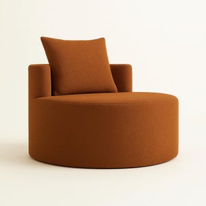 May include: A modern, round armchair in a warm, earthy brown color. The chair features a cylindrical base, short armrests, and a square cushion. The textured fabric adds visual interest to the minimalist design. The chair is designed for comfort and style.