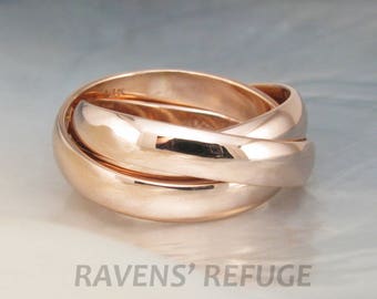 chunky rolling rings / Russian wedding bands (made with gold sourced in the US) -- hand forged in 14k rose gold