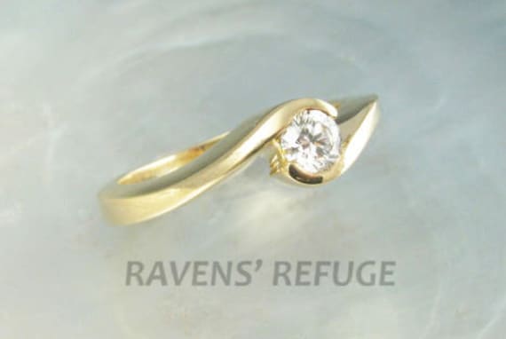 conflict-free diamond engagement ring in 14k yellow gold