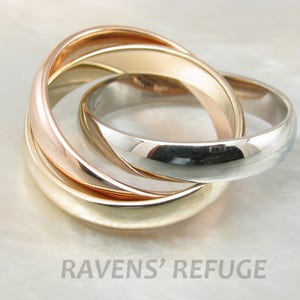 Tricolor rolling rings in 14k gold interlocking bands of three colors in rose gold, yellow gold and white gold image 2