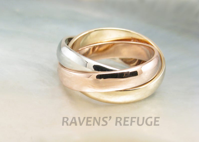 Tricolor rolling rings in 14k gold interlocking bands of three colors in rose gold, yellow gold and white gold image 1