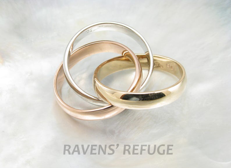 Tricolor rolling rings in 14k gold interlocking bands of three colors in rose gold, yellow gold and white gold image 4