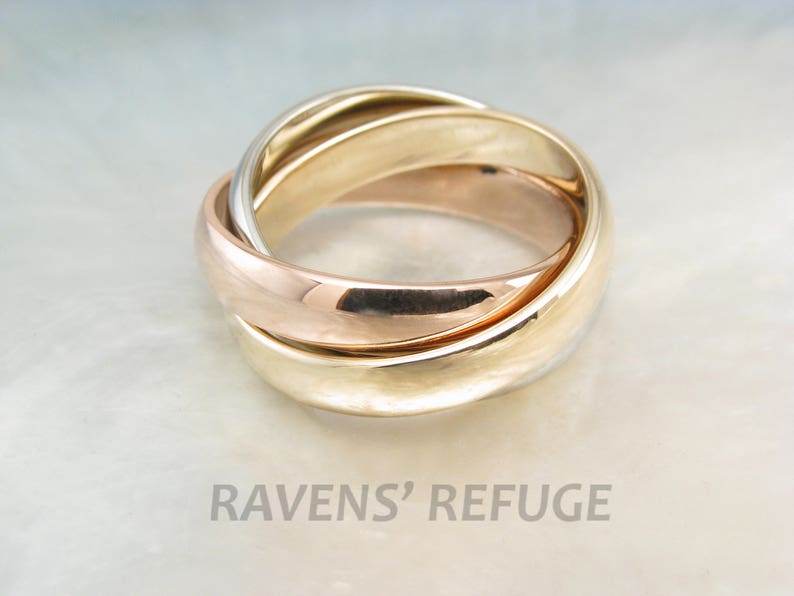 Tricolor rolling rings in 14k gold interlocking bands of three colors in rose gold, yellow gold and white gold image 3