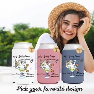 May include: Three can coolers with a cartoon goose design. The coolers are white, pink, and blue, each with a different design. The text on the coolers reads "Mrs. Silly Goose" and "Alison's Bachelorette". The image also includes the text "Pick your favorite design".