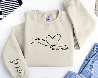 Sweatshirt en hoodie met gepersonaliseerde moeder: hart op mijn mouw, shirt met kindernaam, gepersonaliseerd mama-shirt, cadeau-shirts moeder grootmoeder