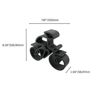 Minimalist cyclist sculpture in a continuous line style, manufactured from plastic and displayed from a high angled top-down perspective to emphasize its flowing shape and surface detail.