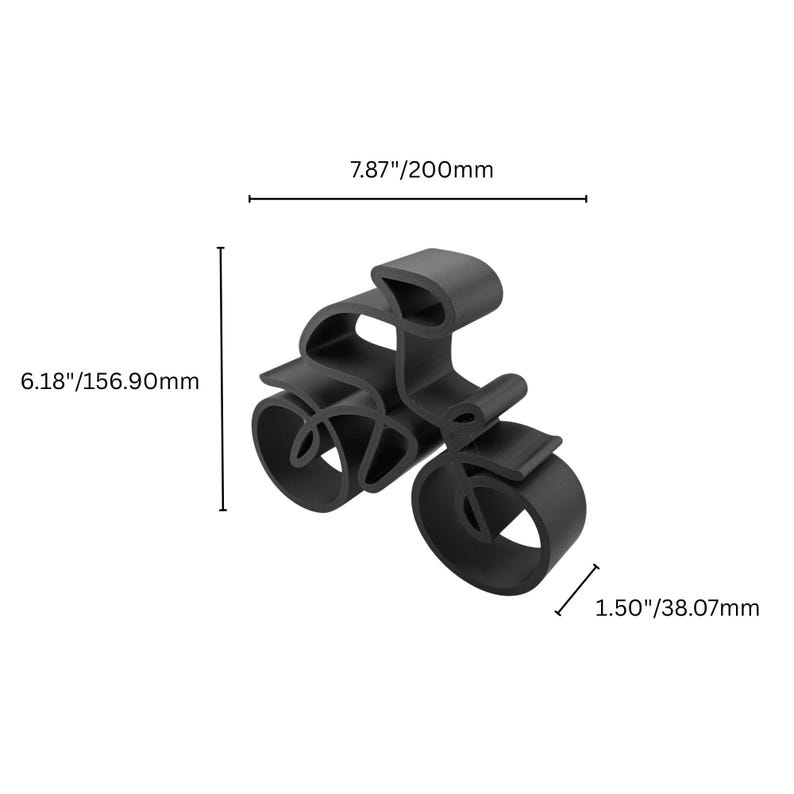 Minimalist cyclist sculpture in a continuous line style, manufactured from plastic and displayed from a high angled top-down perspective to emphasize its flowing shape and surface detail.