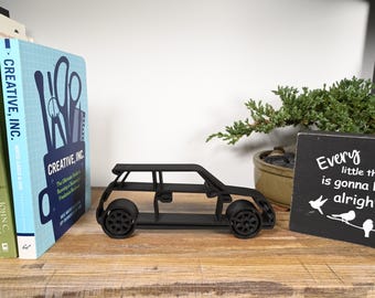 Arte lineal de Mini Cooper S: silueta de coche moderna, decoración de escritorio