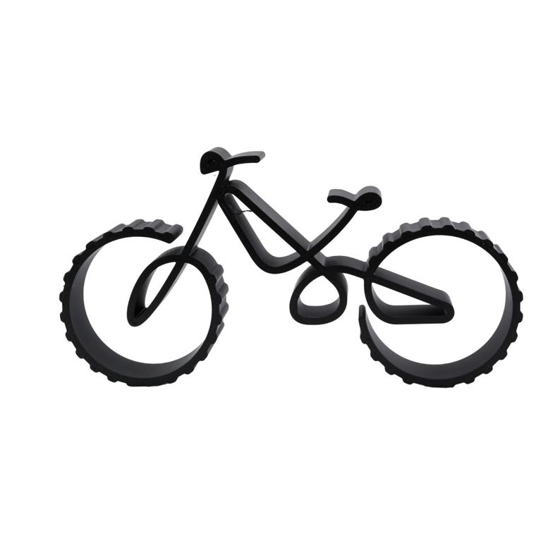Hollow geometric bicycle sculpture with thick ridged wheels, shown from the side on a white background. Viewed straight on with clear silhouette and visible layering texture on the frame and wheels.