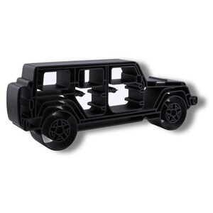 Three-quarter view of Black Jeep Wrangler 4 Door Side View, showing its open-line design and physical depth.