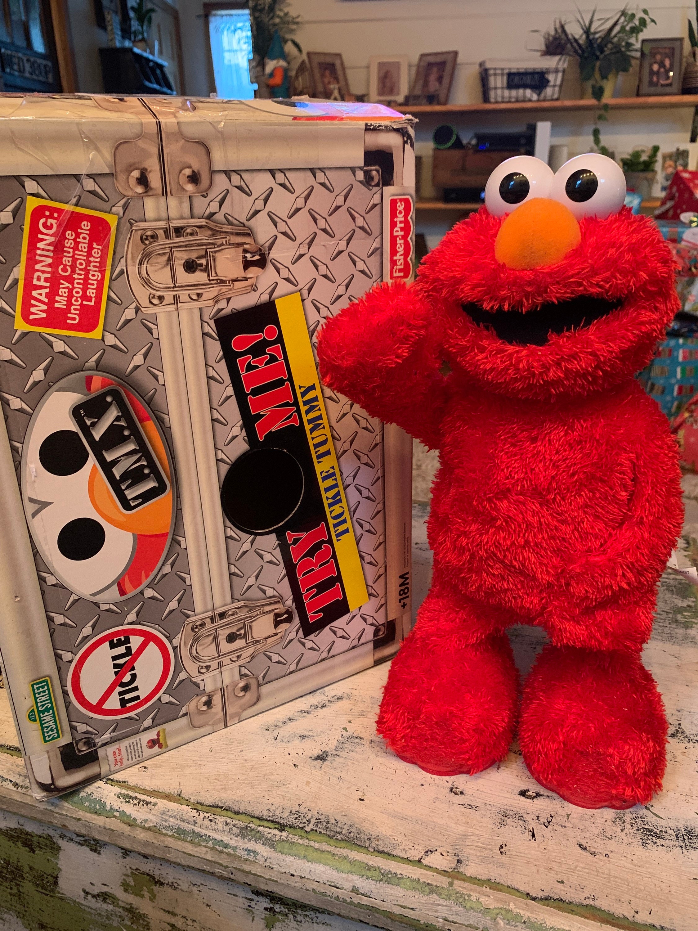 Tickle me elmo in cheap box