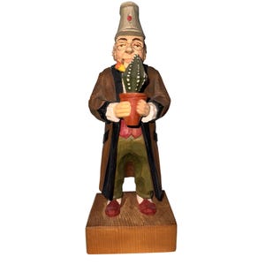 trygg Hand-Carved Wooden Figurine Of Man Holding Potted Cactus