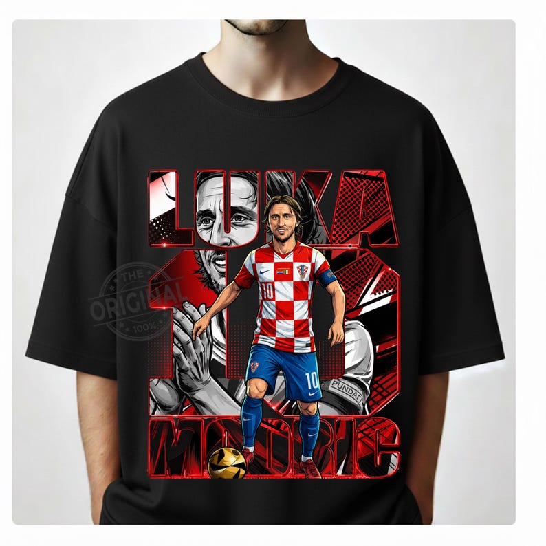 May include: Black t-shirt featuring a graphic of a soccer player in a red and white checkered jersey, blue shorts, and red shoes. The design includes the player's name and the number 10, with additional graphics in red and white.