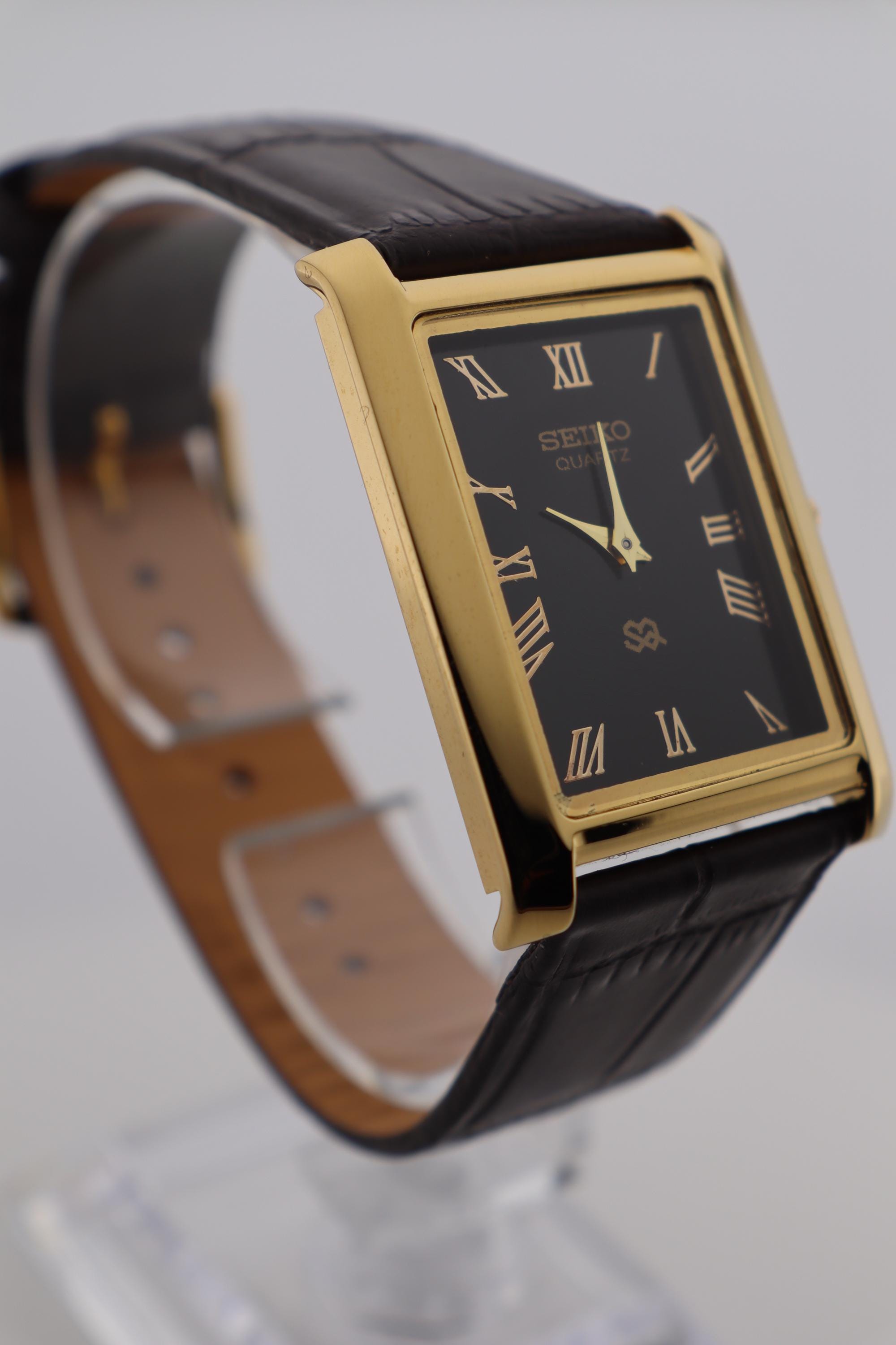 Vintage Seiko Quartz Watch: Slim Rectangle Gold Tone, Black 